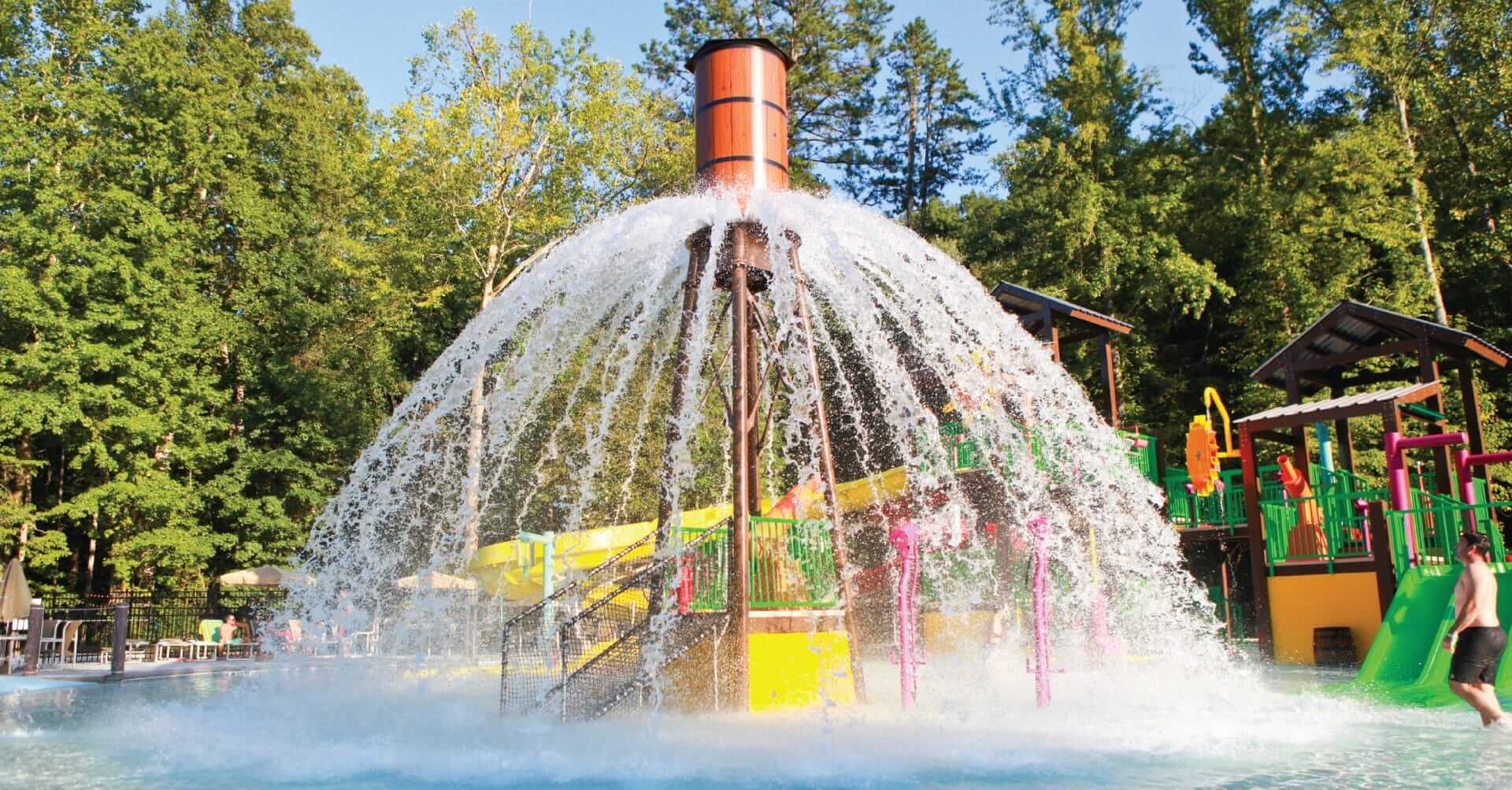 The Power Plunge water feature releases a large volume of water in a 360 degree spray pattern at the Jellystone Golden Valley RV Resort in North Carolina.