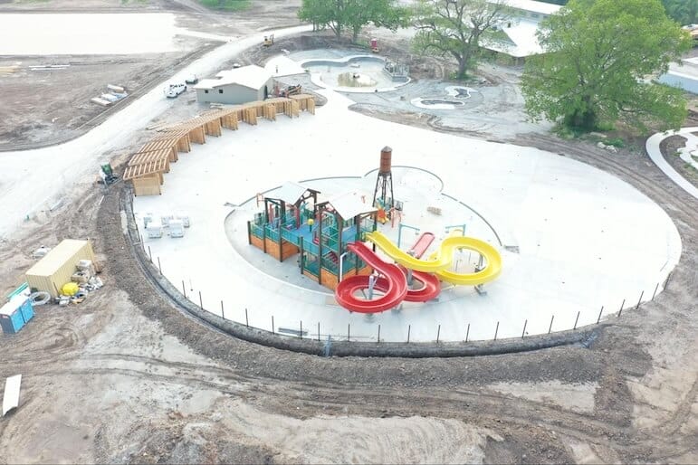 Construction photo of the installation of Interactive Play's multi-level play structure at Camp Fimfo in Waco, Texas.