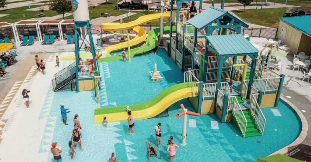 An arial shot of people enjoying the water play structure developed by Interactive Play for the Camp Margaritaville RV resort in Henderson, LA.
